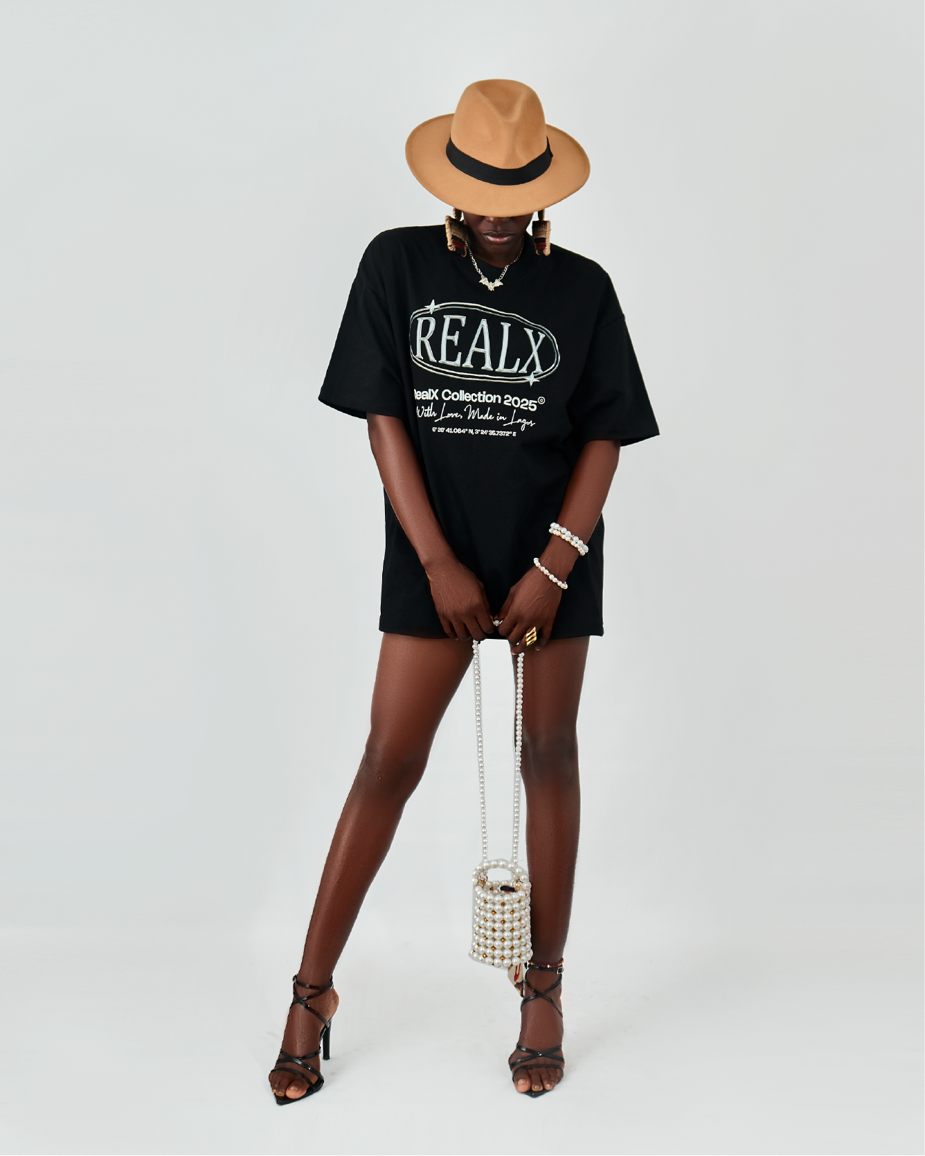 realx model in realx graphic tshirt@0.5x realx model in realx graphic tshirt@0.5x